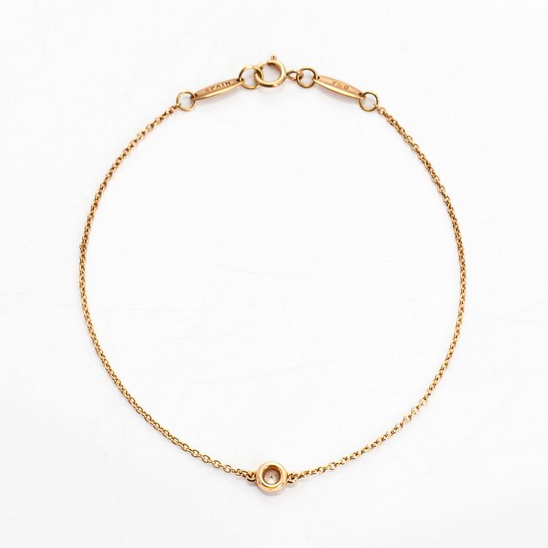 Tiffany & Co, Elsa Peretti, an 18K gold bracelet, 'Diamonds by the Yard', with a diamond approximately 0.08 ct.