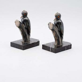 BOKSTÖD, 1 par, patinerad metall, signerade Franjuo, 1900-talets första hälft.