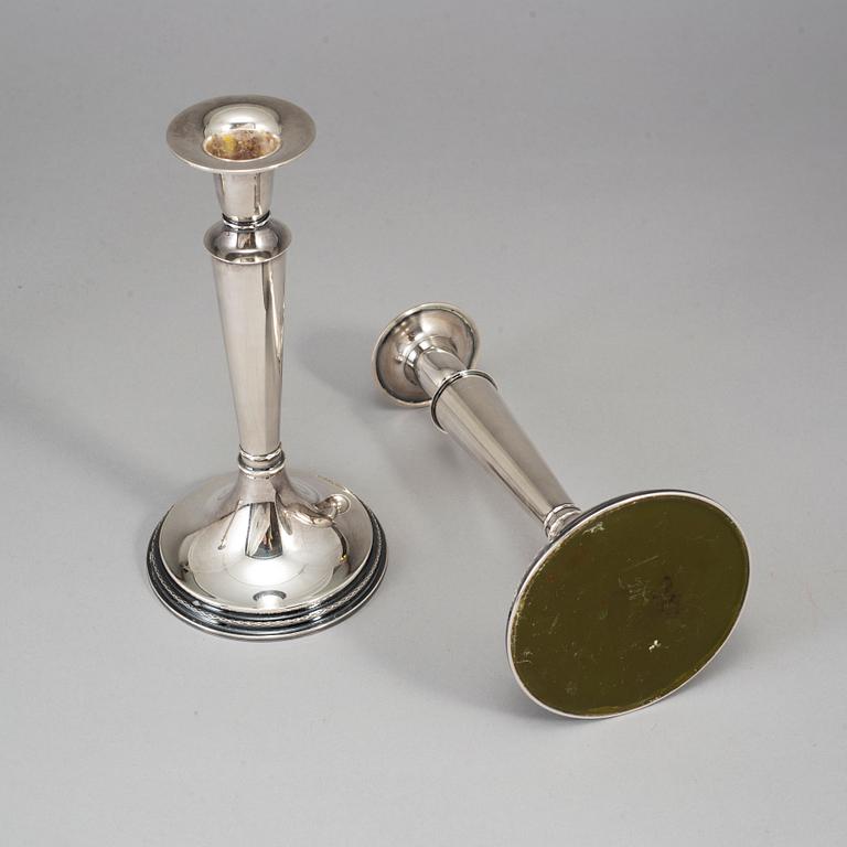Four silver candlesticks from TESI, Gothenburg, 1972-74.