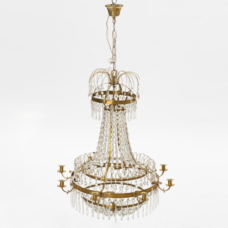A Gustavian style 9 candle chandelier.