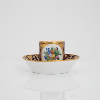 A Sèvres porcelain cup and sacuer, probably 1770's.