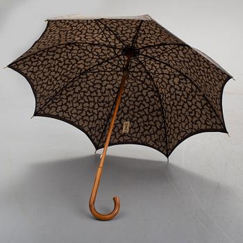 YVES SAINT LAURENT, an umbrella.