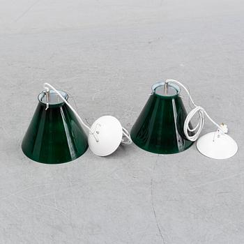 A pair of ceiling lamps in green and white glass, model no 4011, Zero.