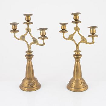 A pair of brass candelabra, Art Nouveau, early 20th century.