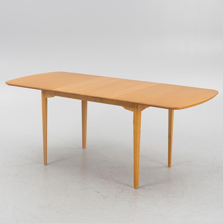 An elm-veneered dining table, Nordiska Kompaniet, Sweden, 1955.