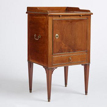 A late Gustavian mahogany-veneered chamberpot cupboard, circa 1800.