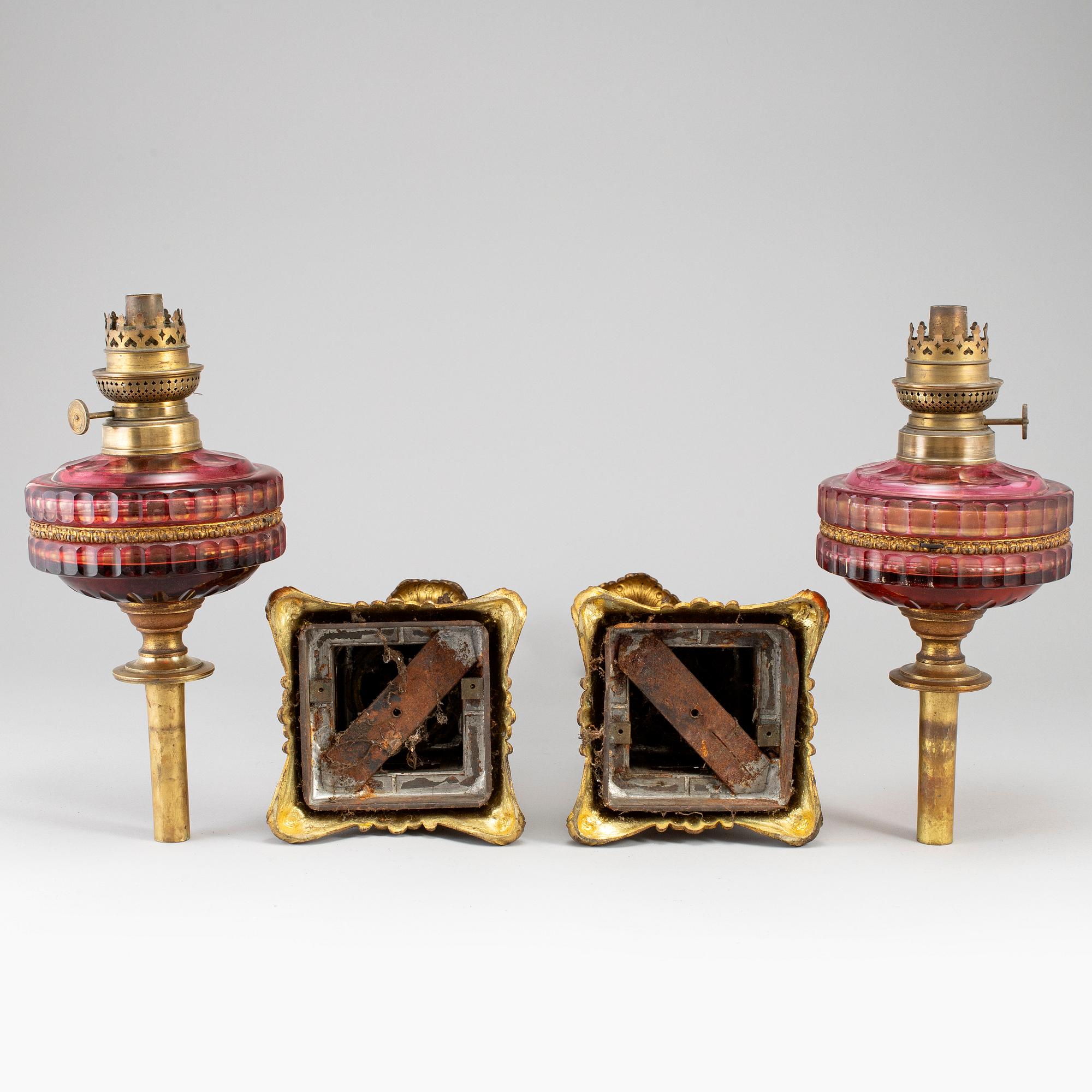 A pair of empire style table oil lamps, bronzed metal and glass, Dublot Freres, Rennes, late 19th century.