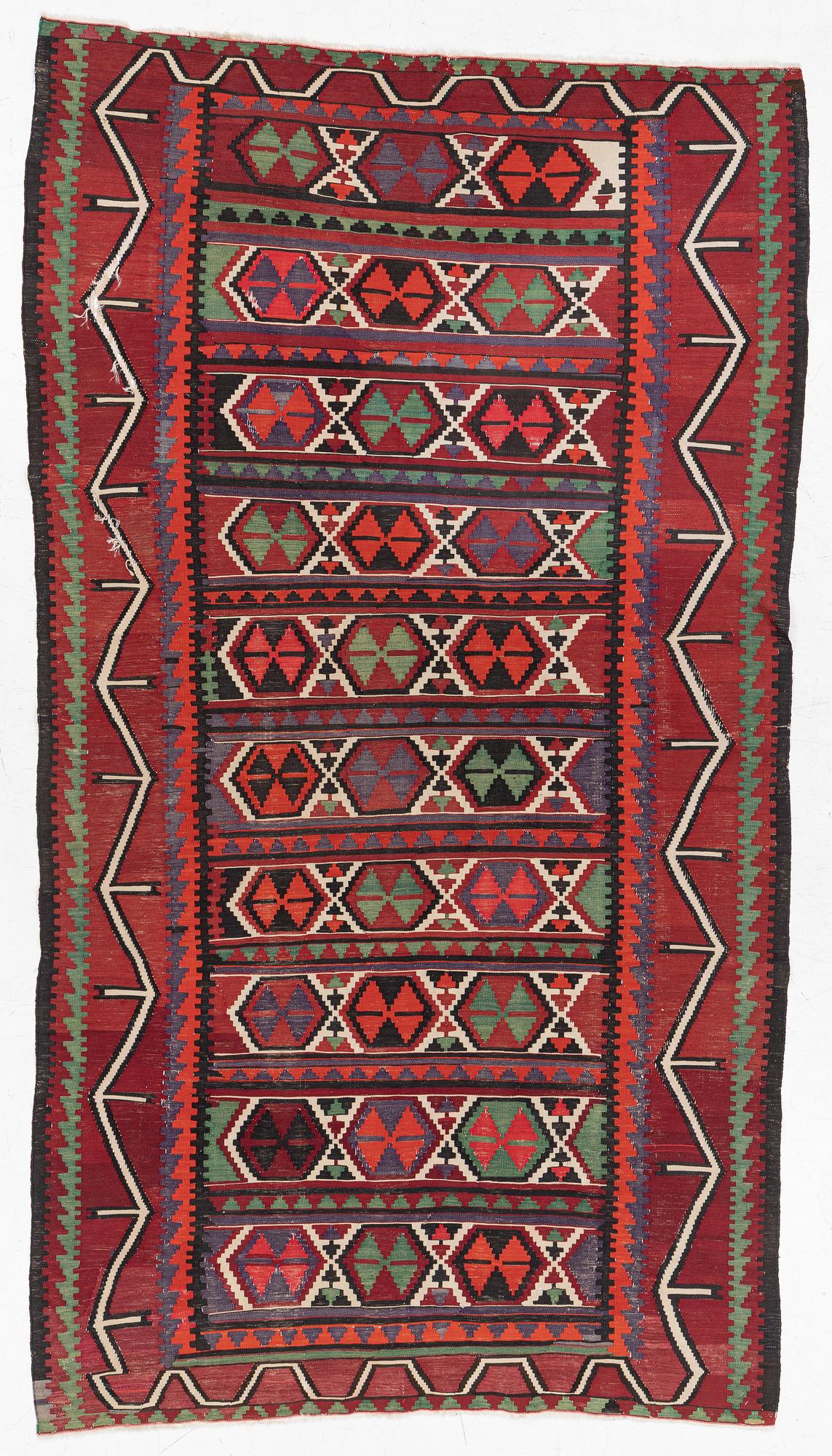 A Kelim carpet, c. 300 x 170 cm.