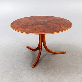 A Josef Frank walnut root coffee table, model 1028, Firma Svenskt Tenn, second half of the 20th century.