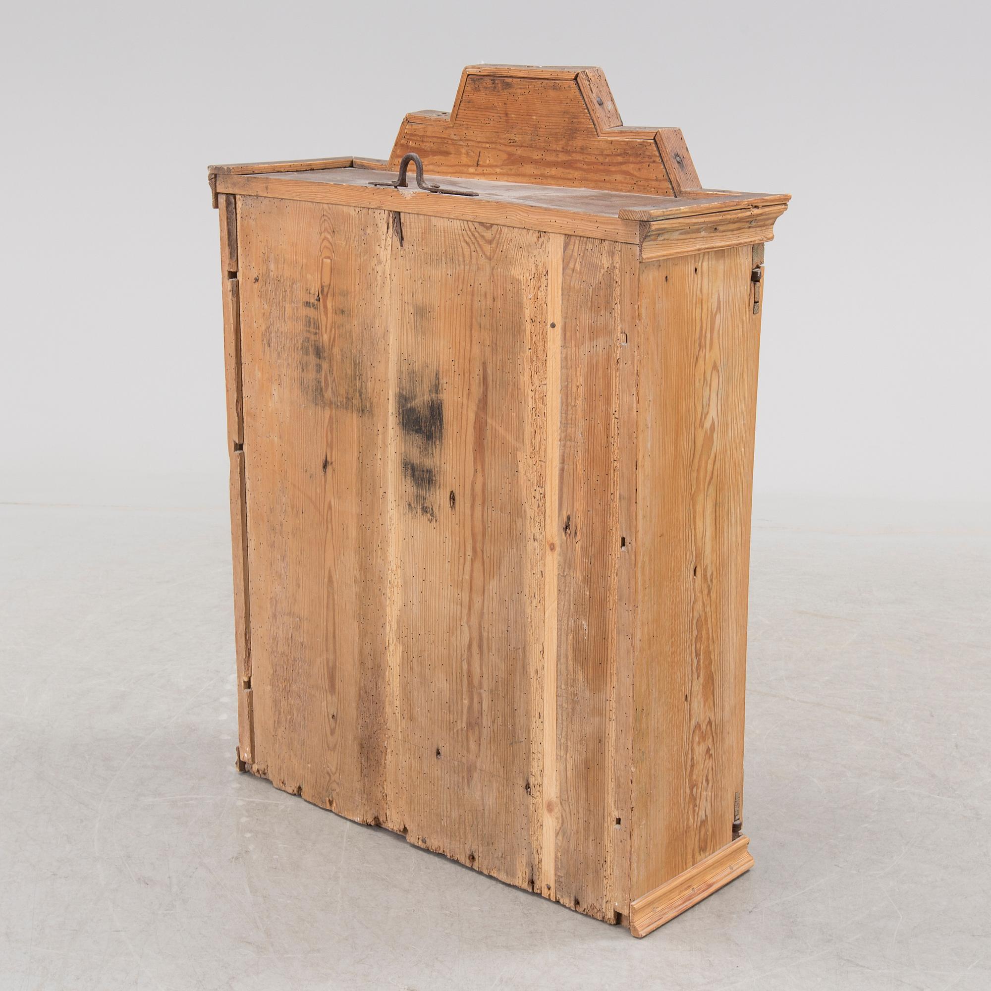 A first half of the 19th century cabinet.