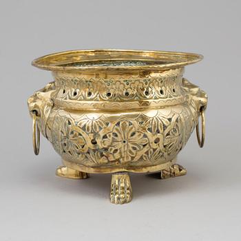 A 18th/19th century brass flower pot.