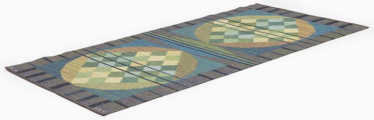 a carpet, flat weave, c 207 x 104.5 cm, signed JLH IMV.