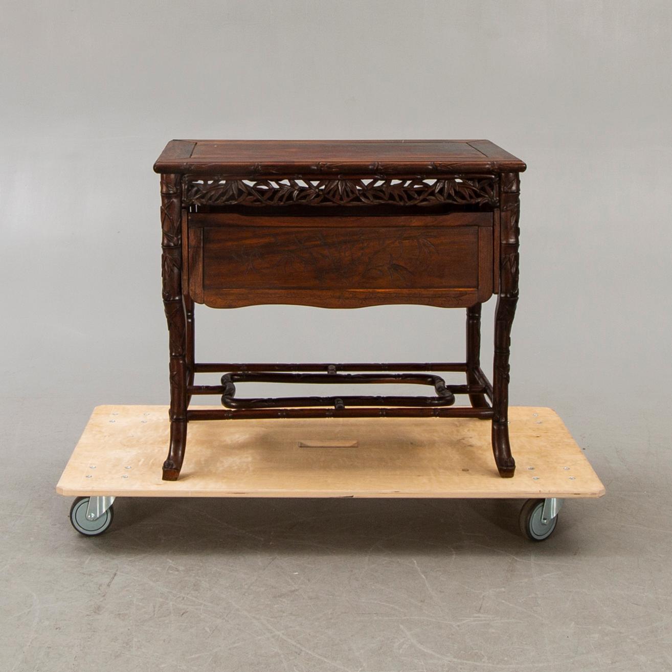 An Asian 20th century serving table.