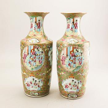 A pair of Chinese kanton vases later part of the 19th century porcelain.