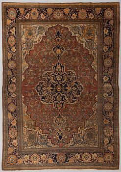 A CARPET, semi-antique Sarouk Feraghan, around 372 x 266 cm.