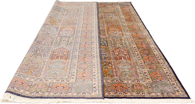 A carpet silk Kashmir, c 330 x 245 cm.