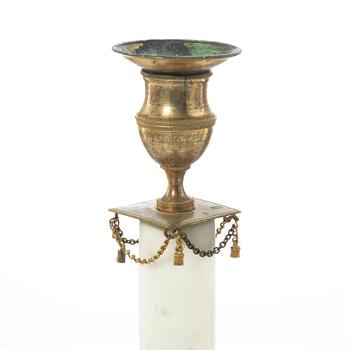 A pair of late Gustavian gilt brass and marble candlesticks, circa 1800.