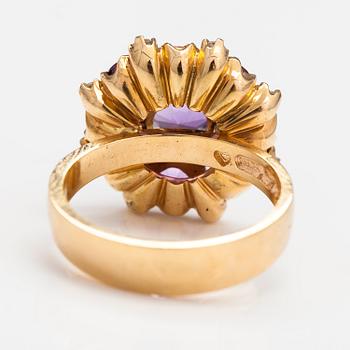 An 18K gold ring with ametysts and diamonds ca. 0.20 ct in total. Ofelia Jewelry, Helsinki 1998.