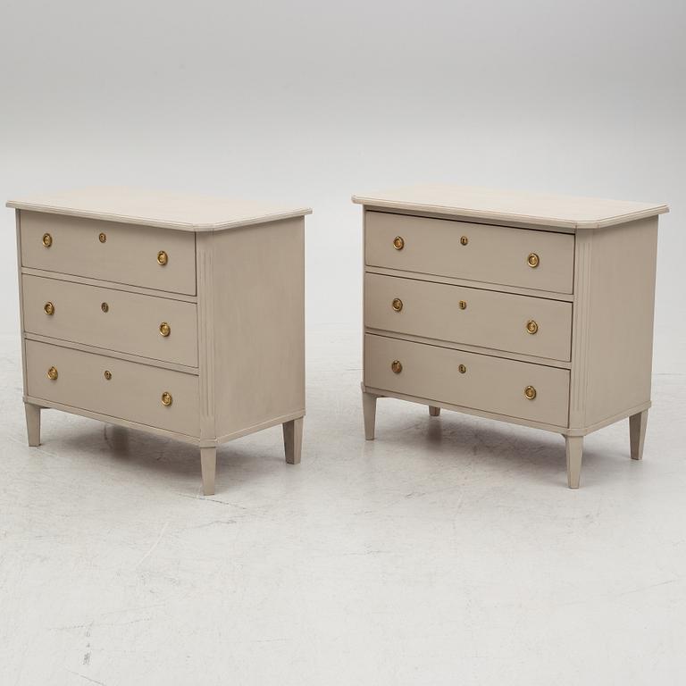 A pair of Gustavian style chest of drawers, mid 20th Century.