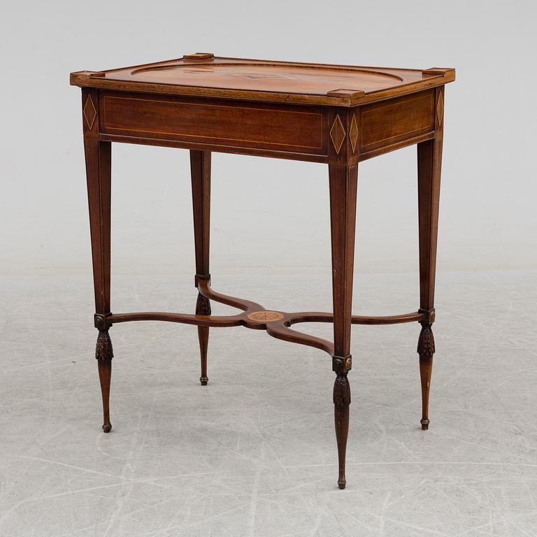 A circa 1800 table in the style of Lars Qvarnberg.