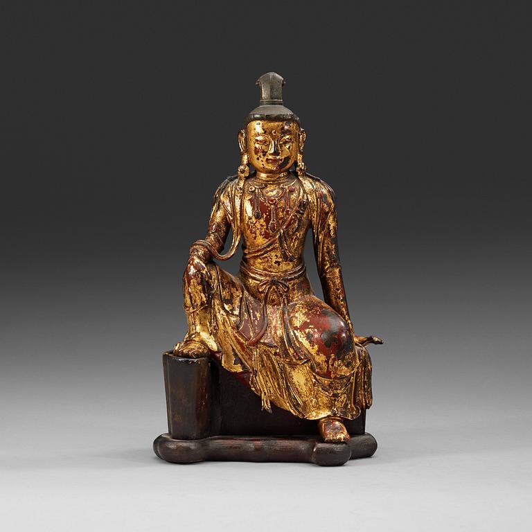 A seated gilt and lacquered bronze Bodhisattva, Ming dynastin, 17th Century.