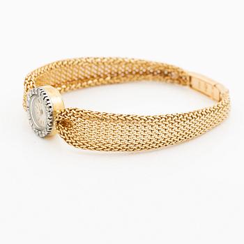 Piaget, armbandsur 18K guld och runda briljantslipade diamanter med länk av W.A. Bolin.