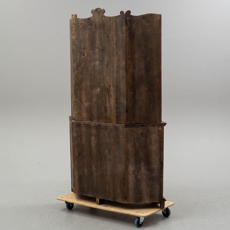 A 19th century corner cupboard.