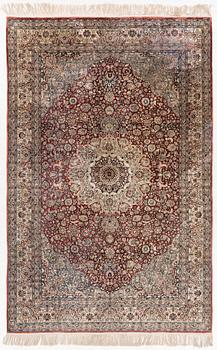 Carpet, part silk, approx. 240 x 158 cm.
