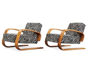 13. Alvar Aalto, a pair of 'Tank' easy chairs, model no 400, Artek, Finland.