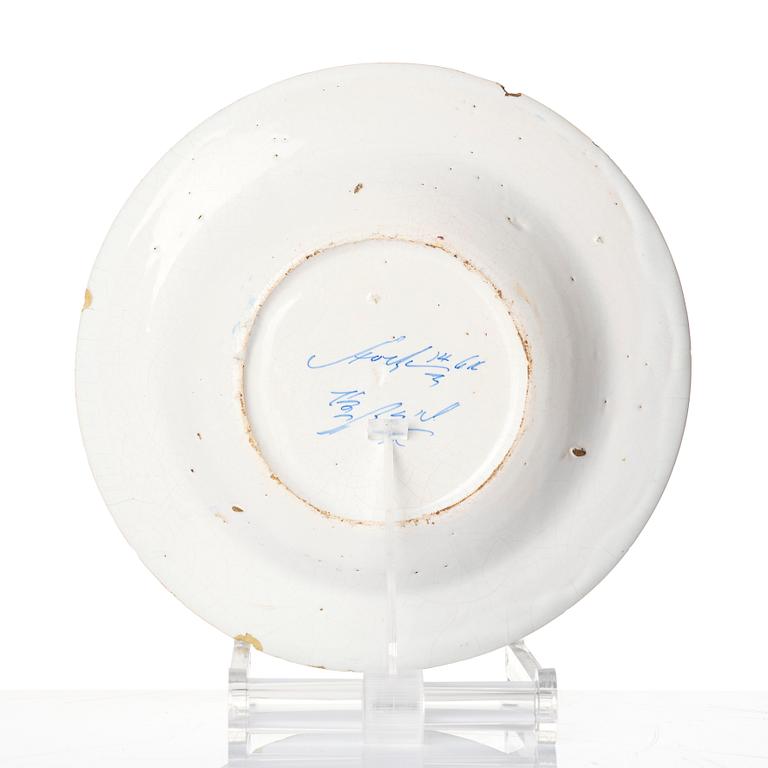 A Swedish faiance dish, Rörstrand Stockholm, dated 1761.