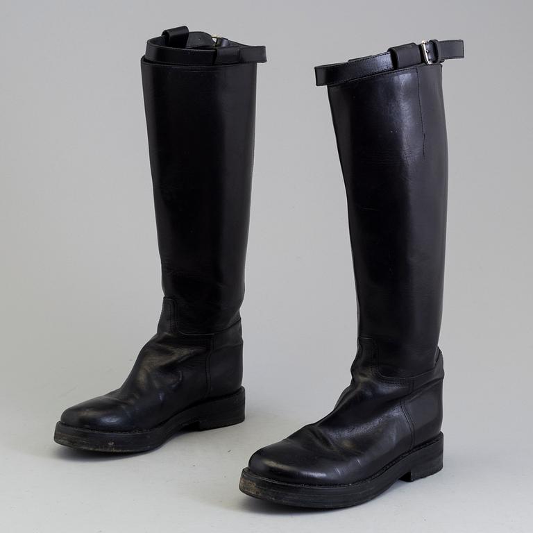 a pair of Ann Demeulemeester, "Vitello Lucido Nero Riding Boots". Size 38.