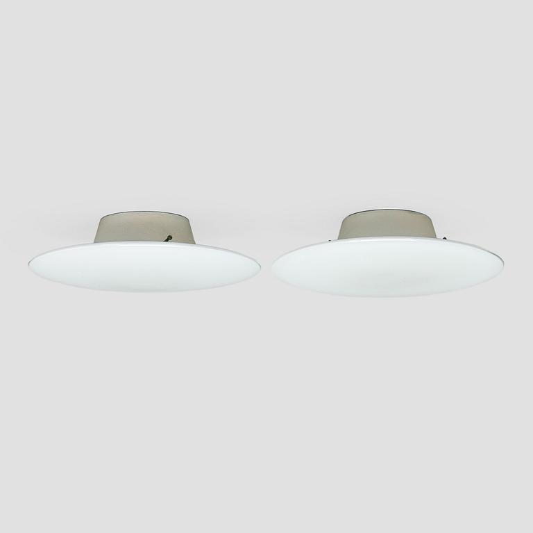 Arne Jacobsen, a pair of 1960's 'AJ-Eklipta' ceiling/wall lamps, for Louis Poulsen/licensed manufacturer Orno, Stockmann.