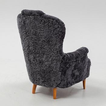 Carl Malmsten, a shearling upholstered 'Farmor' lounge chair from Oh Sjögren.