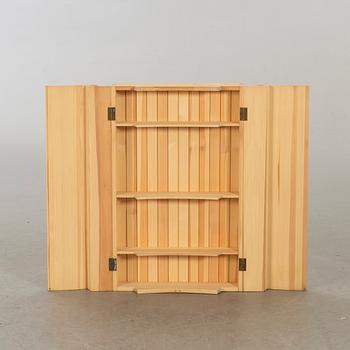 OLOF PIRA, A PINEWOOD WALL CUPBOARD DESIGN OLOF PIRA.