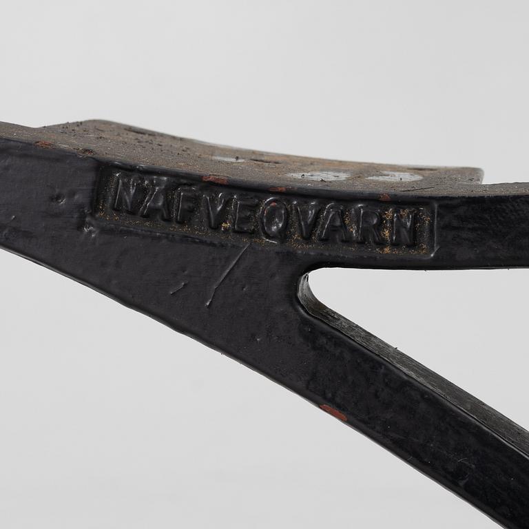 Näfveqvarn, ends for a bench, cast iron, early 20th century.