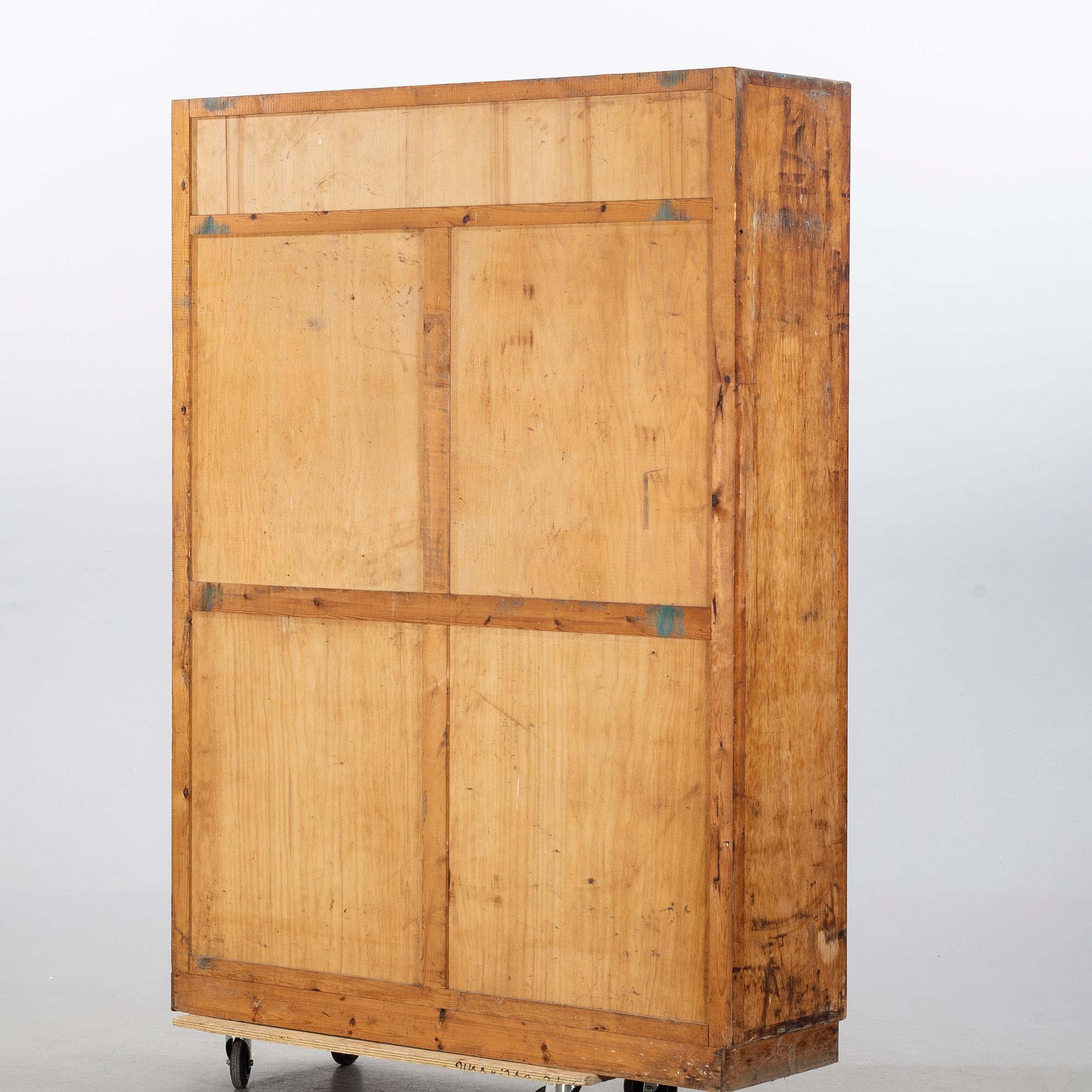 a roll top cabinet, mid 20th century.