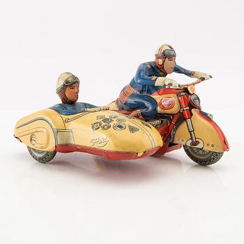 Toy motorcycle with sidecar. Huki Germany mid-20th century lithographed tin.