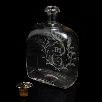 A set of five snapps glasses and a snapps bottle, with Gustav III crowned monogram. 20th century, Baroque-style.