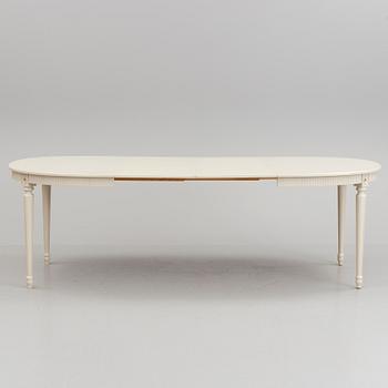 A 20th century Swedish Gustavian style dining table.