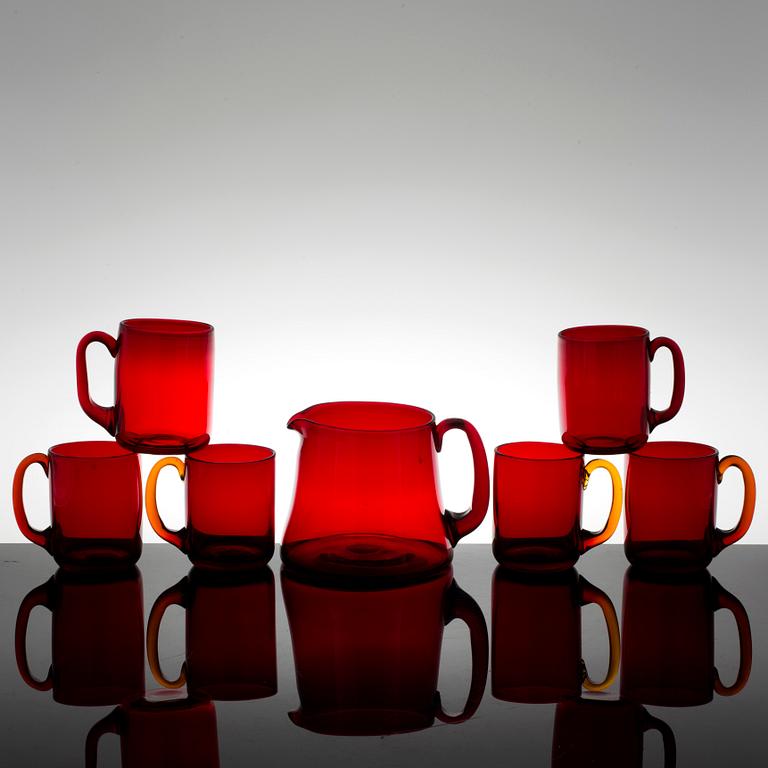 A Reijmyre jug and 6 glasses of ruby glass, third quarter of the 20th century.