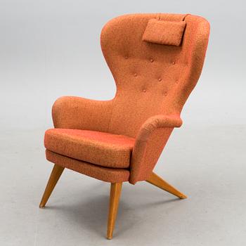 A mid-20th century 'Siesta' armchair for Puunveisto Oy - Träsnideri Ab, Finland.