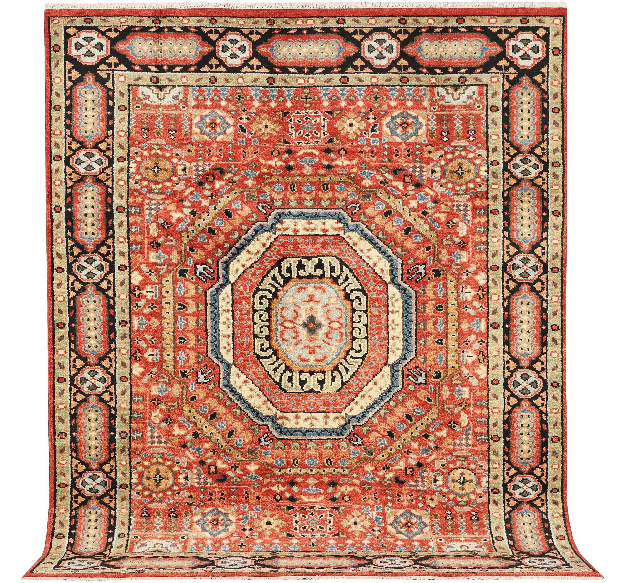 A Mamluk design carpet, c. 304 x 235 cm.