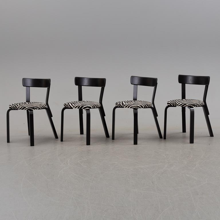 a dining table '81B' and four '69' chairs by Alvar Aalto, Artek.