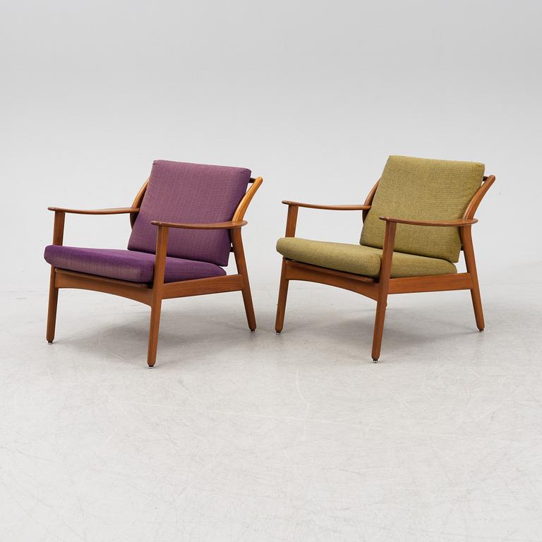 Niels Kofoed, a pair of Danish mid 20th century teak easy chairs.