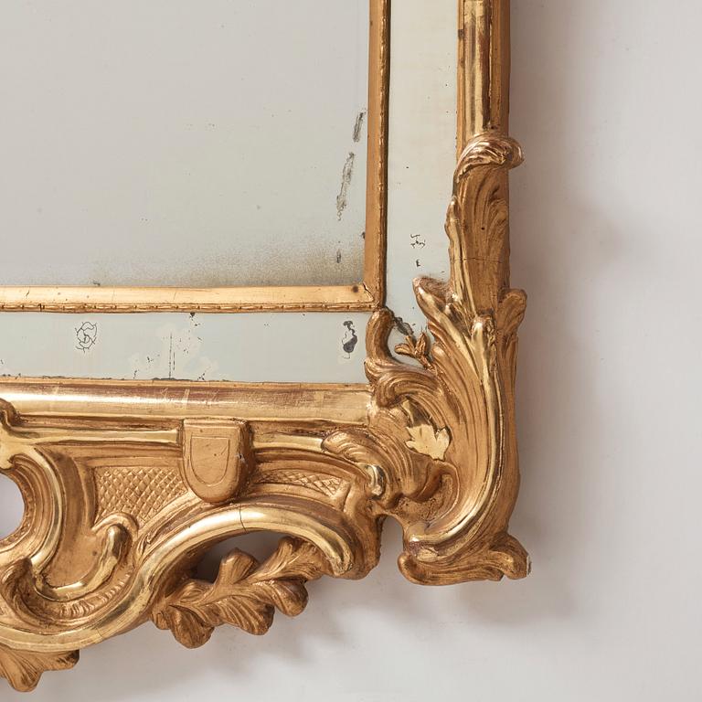 A Swedish Rococo 18th century two-light mirror/girandol mirror.