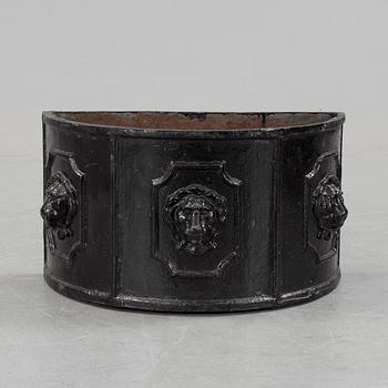 A cast iron jardeniére, 20th century.