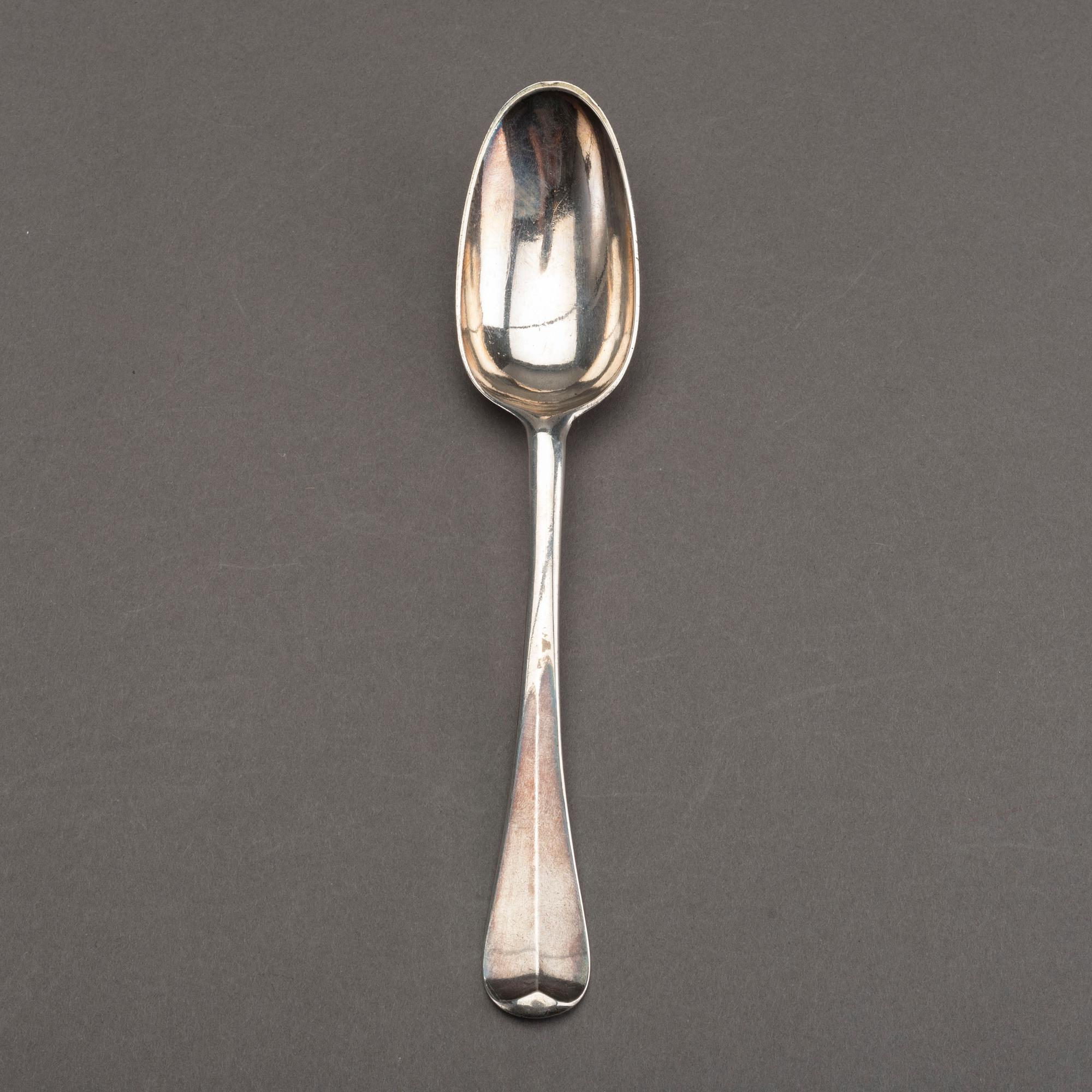 A n English 18th century silver rat-tail spoon, mark London 1719-20.