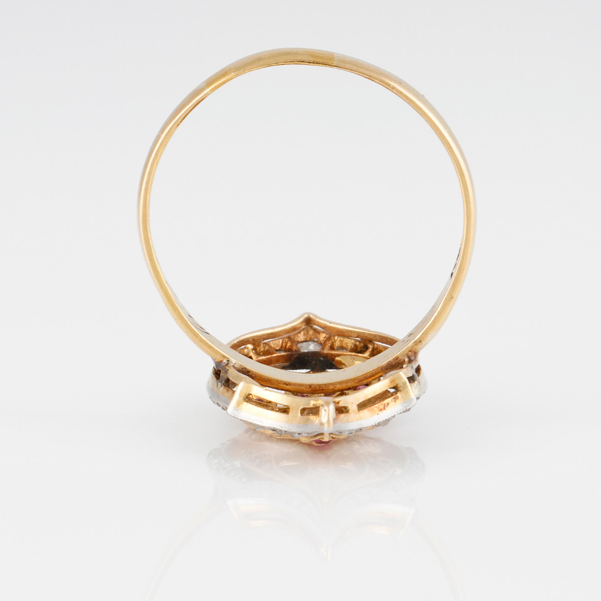 RING, 20K guld, med fasettslipade rubiner och diamanter, W.L. Göteborg, 1869. Vikt 4,9 gram.