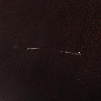 A "Athos" dining table by Paolo Piva for B&B Italia.