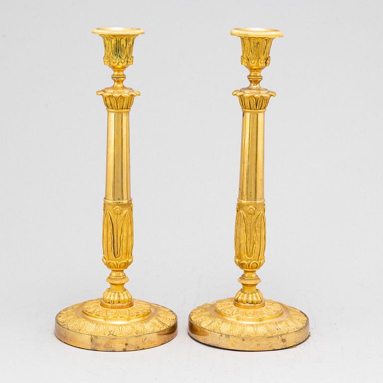 A pair of French Empire candlesticks, early 19th century.